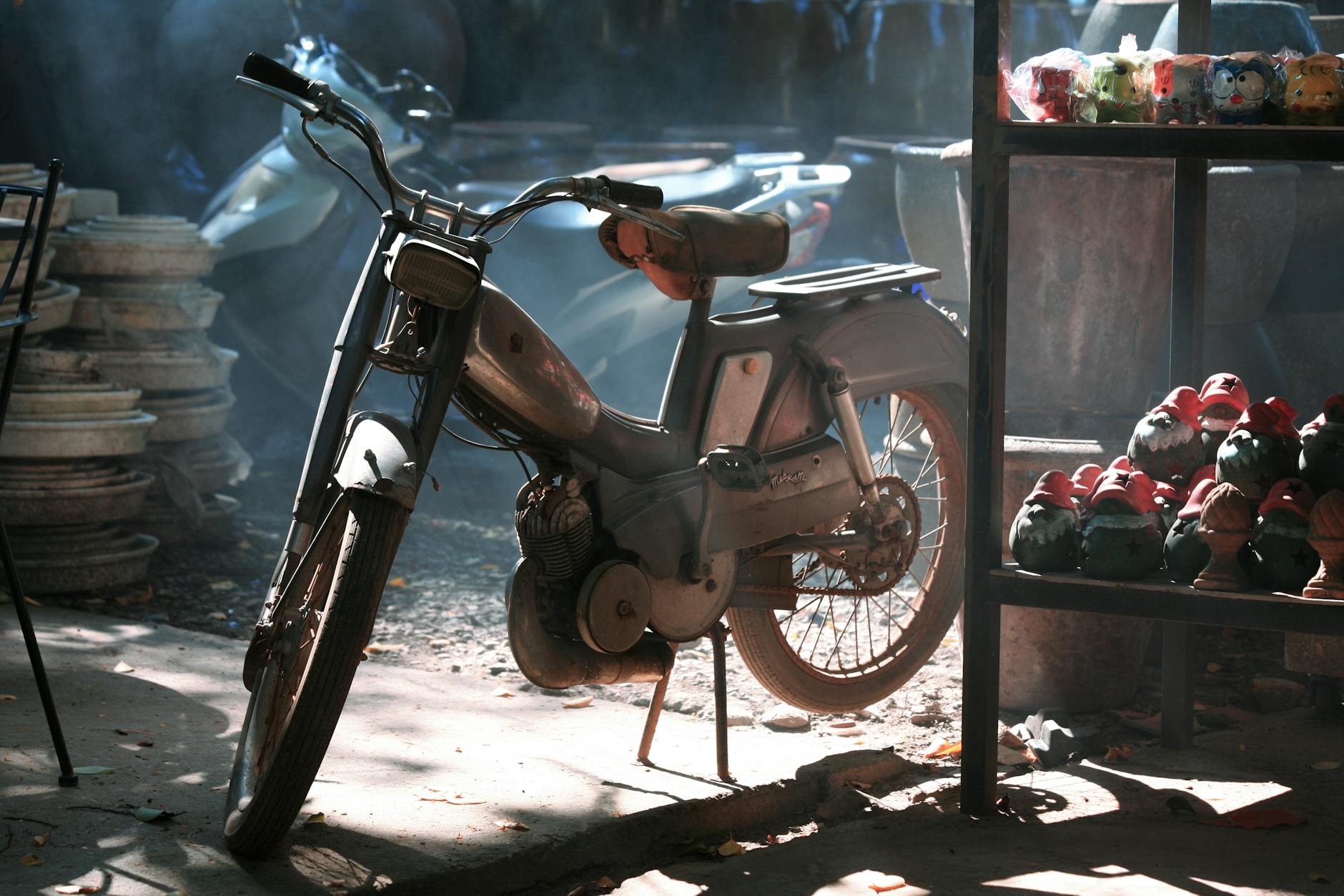 vintage motorbike standing in a garage