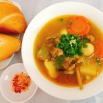 soup in a bowl and bread
