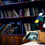 rubik s cube on book