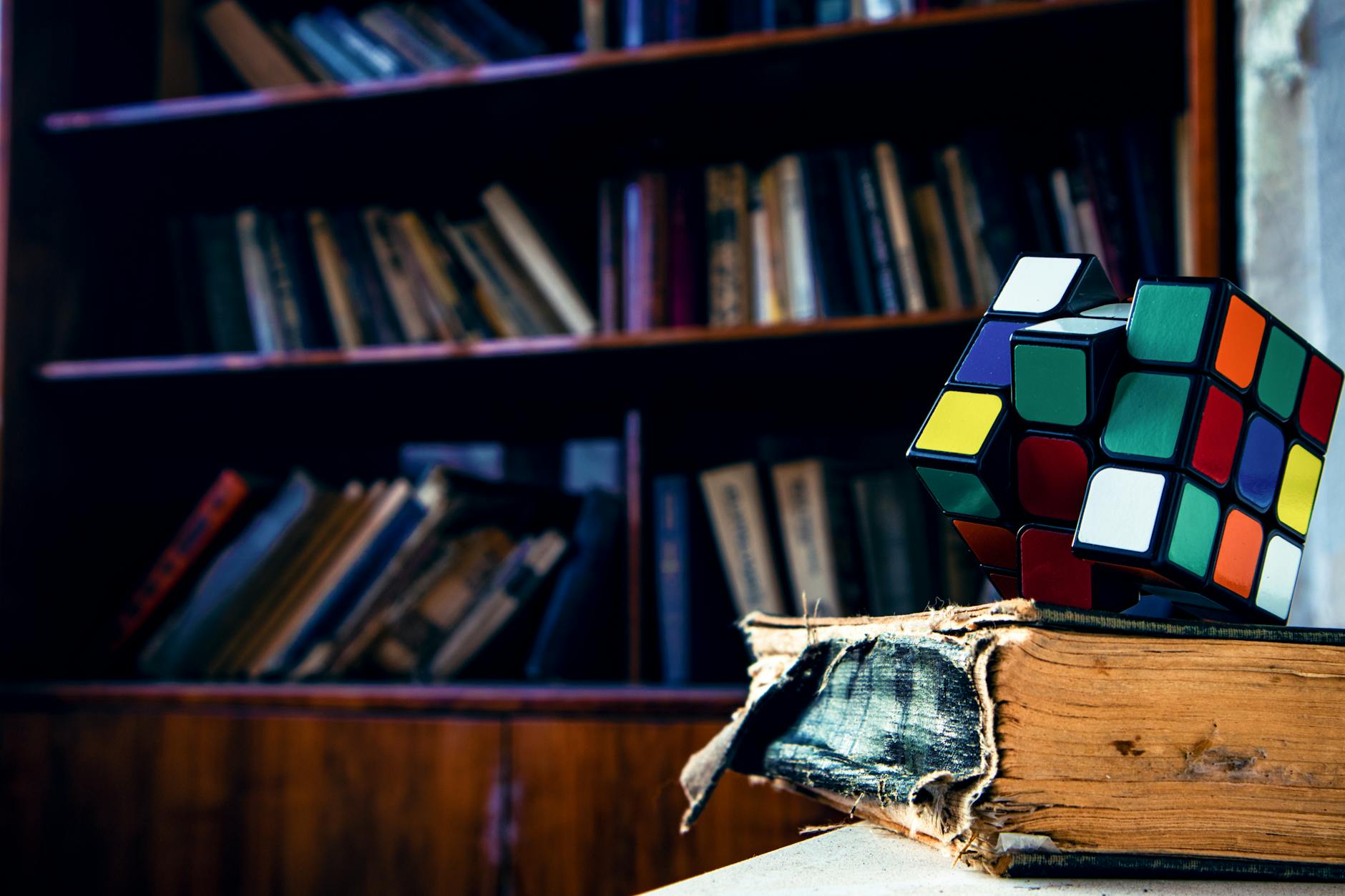 rubik s cube on book
