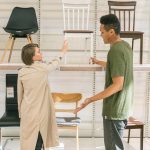man and woman in furniture shop