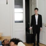 a man entering a room