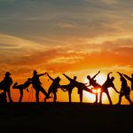 silhouette of people during golden hour