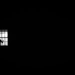person looking out the window