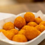 delicious crispy cheese balls on a platter