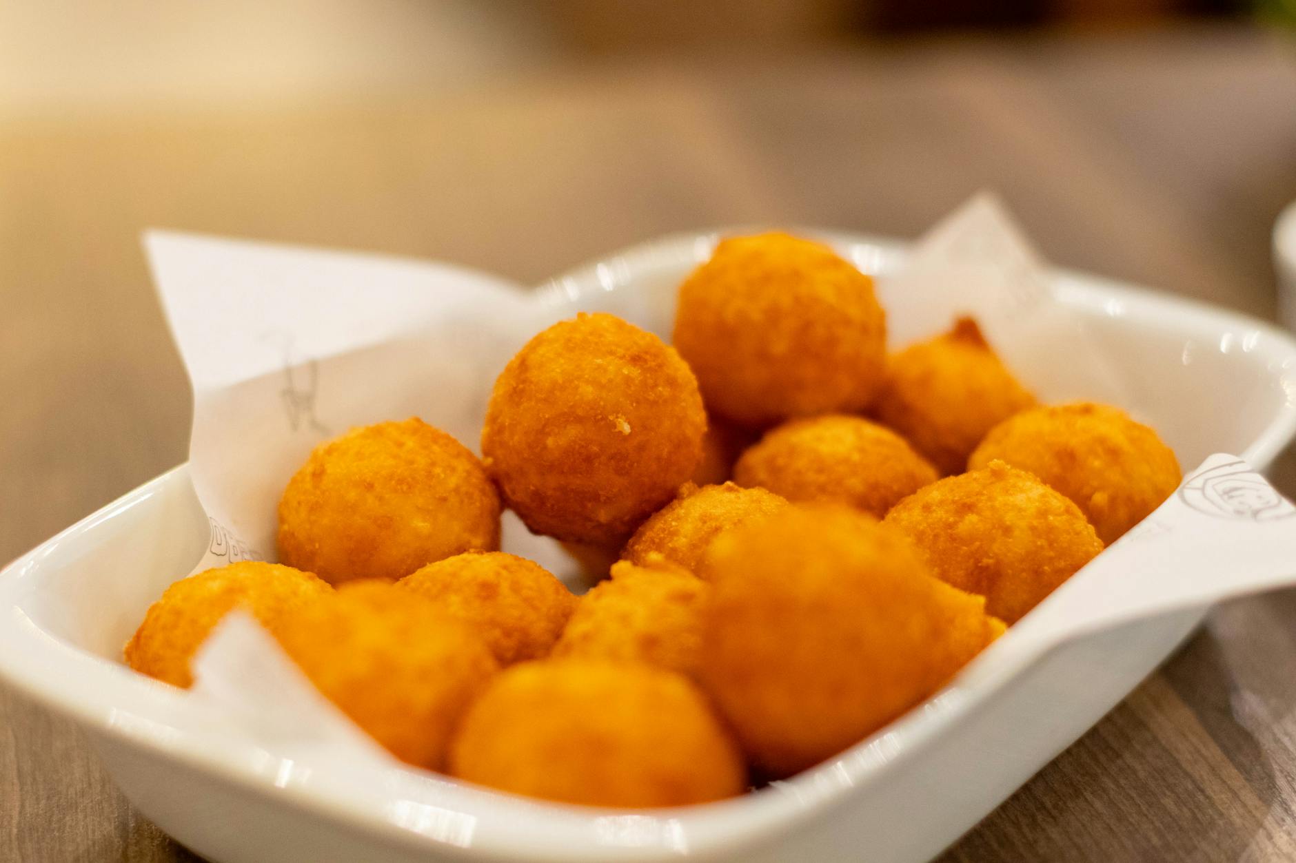 delicious crispy cheese balls on a platter
