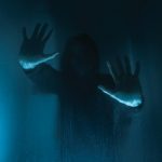 woman silhouette in darkness