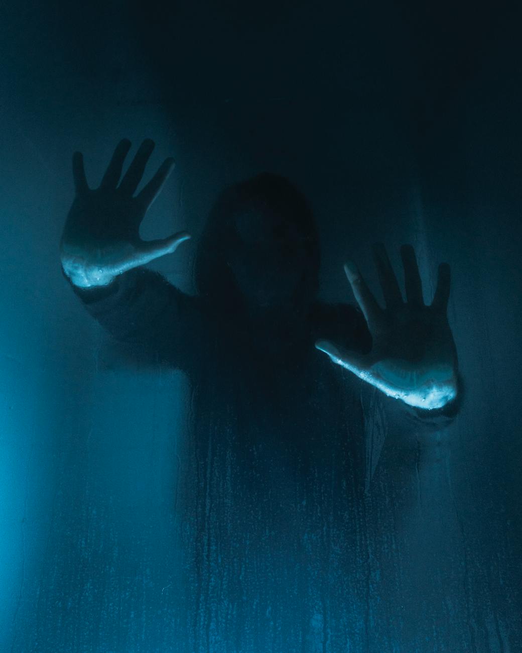 woman silhouette in darkness