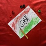 arabic calligraphy on a piece of paper