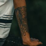 an arm with tattoo