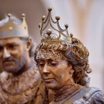 a woman in a role play as a queen