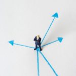 human toy in blue suit jacket