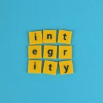 word integrity on blue background