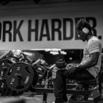 man practising on a gym in black and white