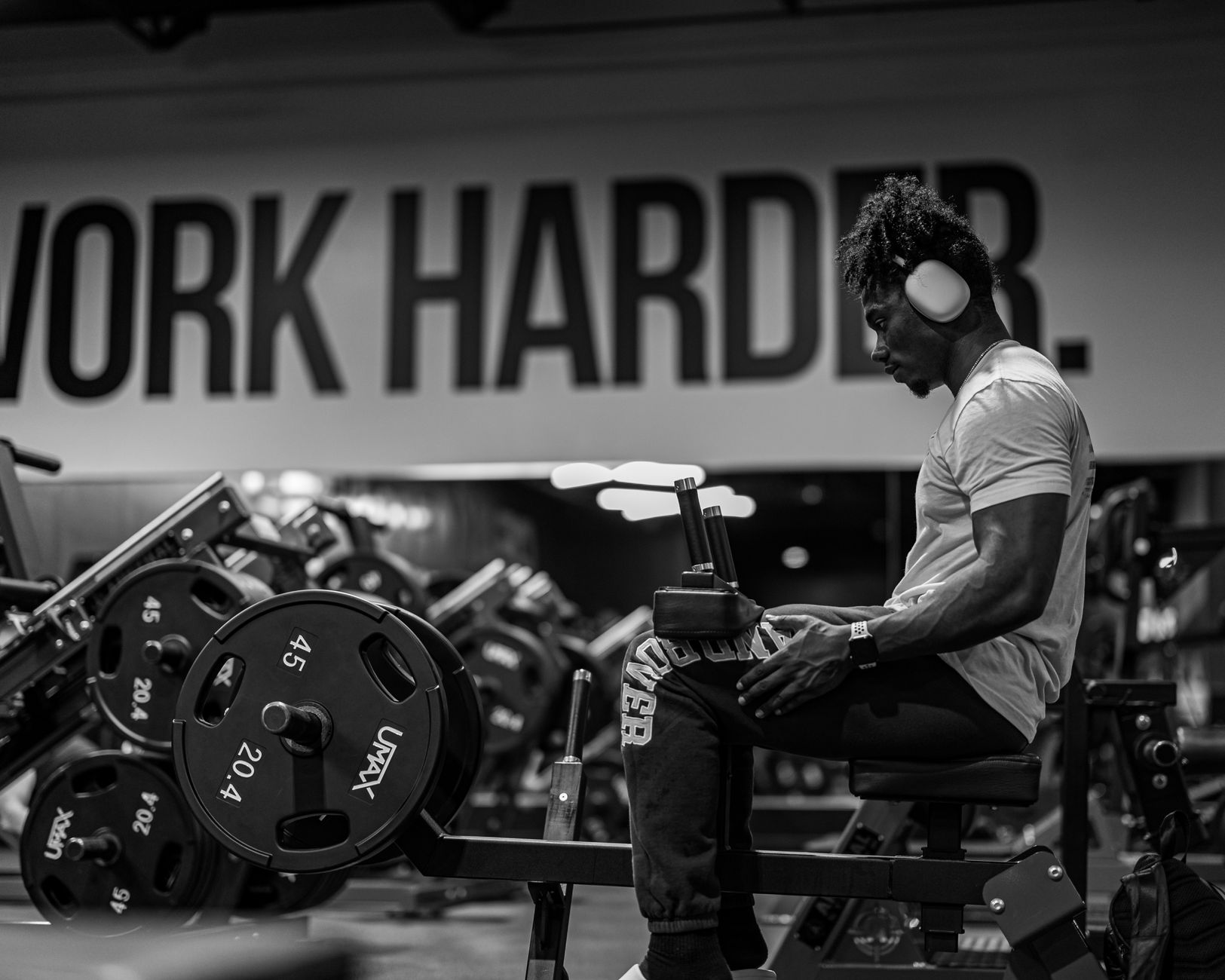 man practising on a gym in black and white