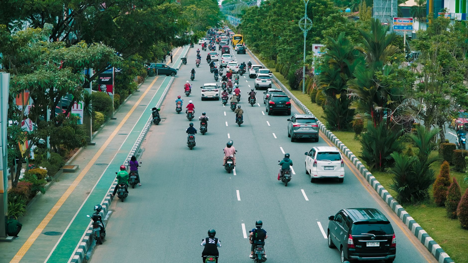 motorbikes and cars on a street