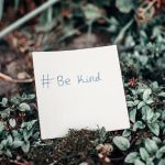 white printer paper with be kind text on plants