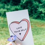 person holding a card