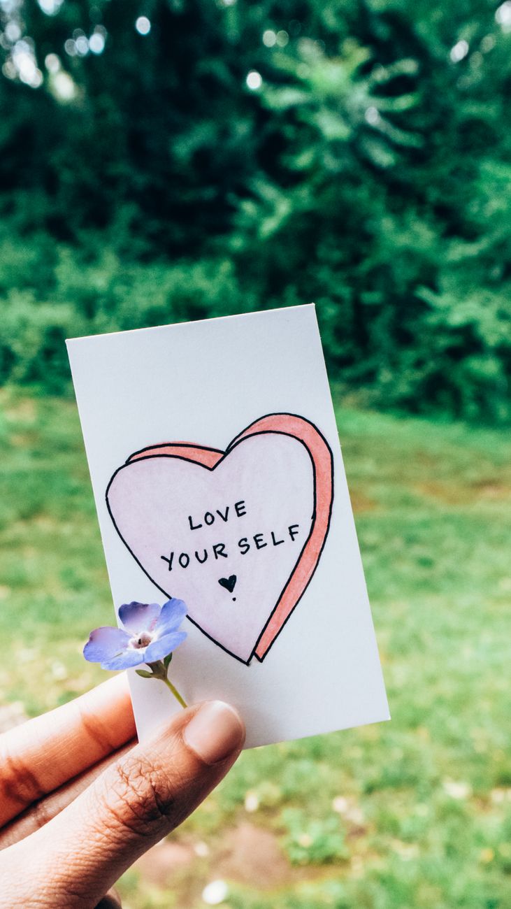 person holding a card